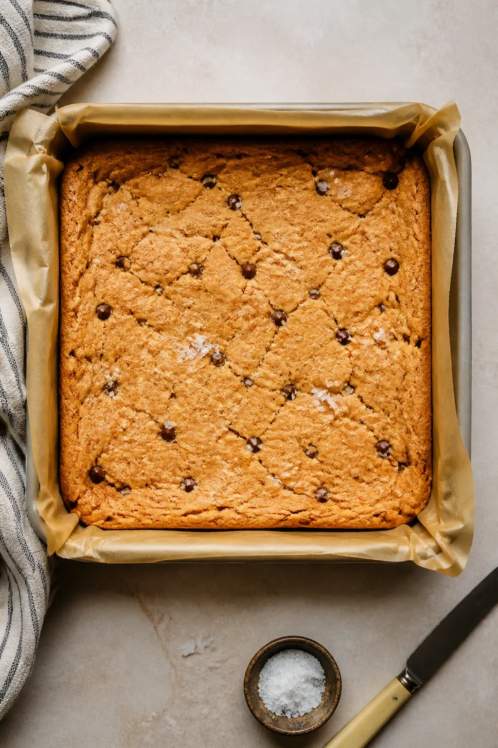 Tasty top view, post-bake: Overhead shot of a golden slab of low carb protein blondies just out of t